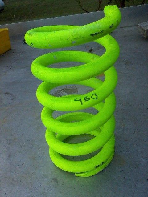 Front spring 950# 5" dia. 10" height, ground flat one end nascar imca racing