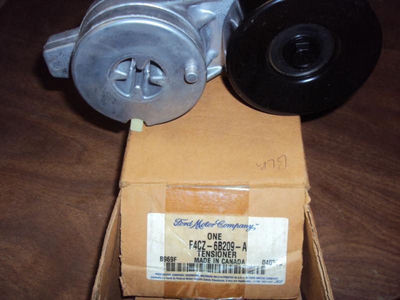 Nos ford motor co. tensioner f4cz-6b209-a