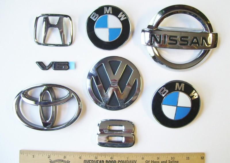 Lot of 8 emblems ~mixed lot~ great conditions ~body shop surplus all nice!