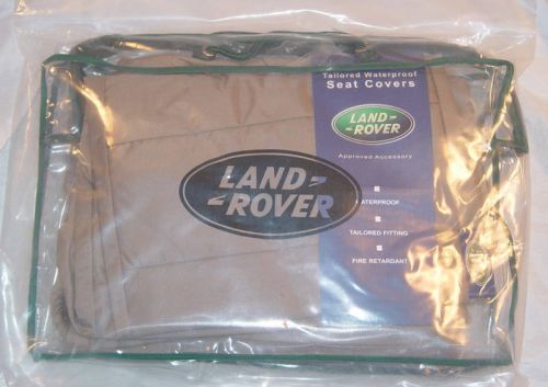Land rover brand lr4 oem front waterproof almond or ebony seat covers brand new