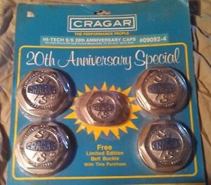 Rare complete cragar, 20th anniversary s/s center caps, &amp; belt buckle mib