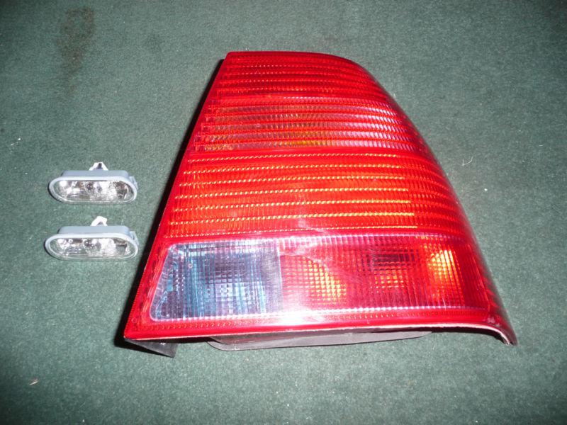 Volkswagen jetta right passenger tail light and two clear side lights