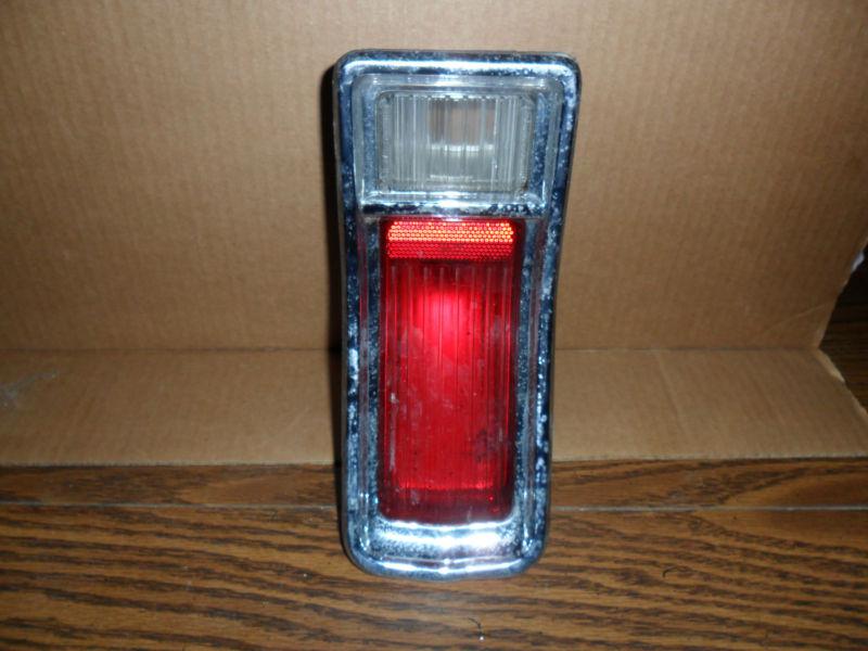 1963 buick special oem lh tail light with bezel and mounting studs