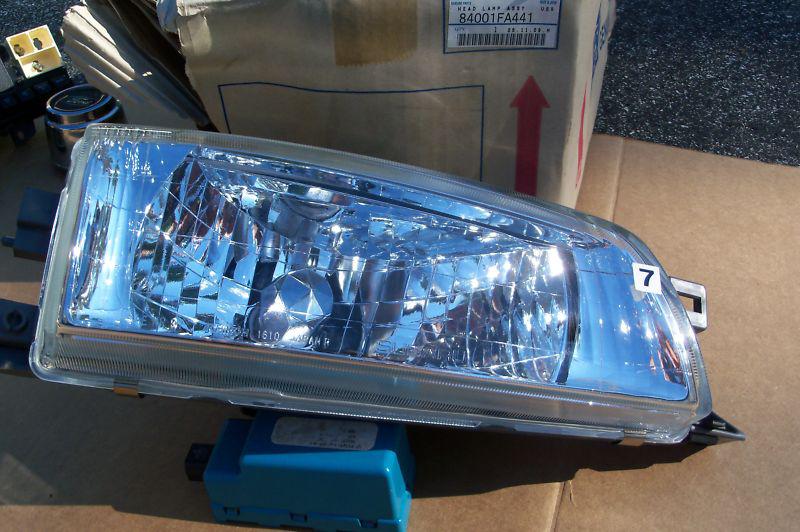 Subaru impeza right hand passenger factory nos headlight !!