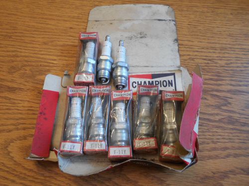 Vintage champion spark plugs ford