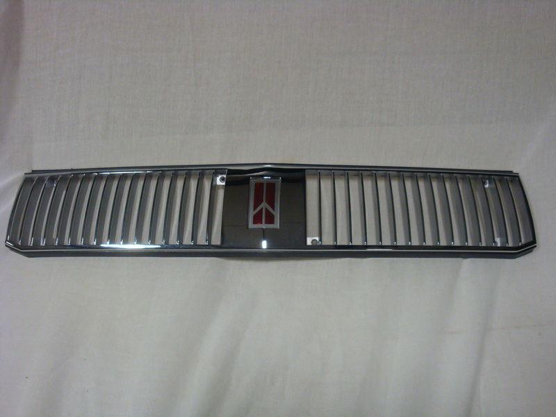 Nos radiator grille with emblem cutlass ciera & cruiser  wagon chrome 1989 -92