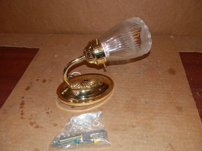 110 volt single polish brass light with clear cover ( new )
