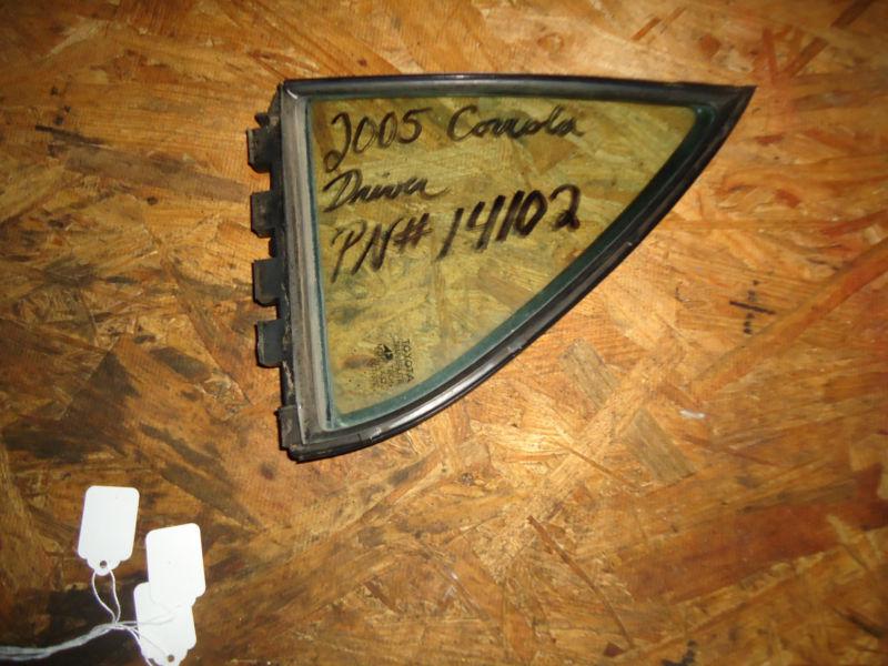 Rear driver left side door small triangle glass toyota corolla 2000-05 14102