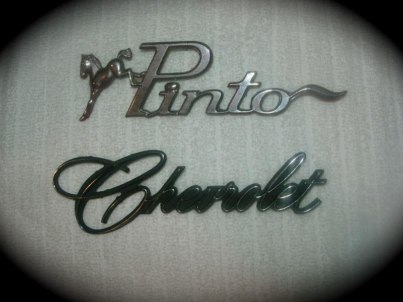 2 great antique car emblems! chevrolet & ford pinto! (1) money from estate/fine!