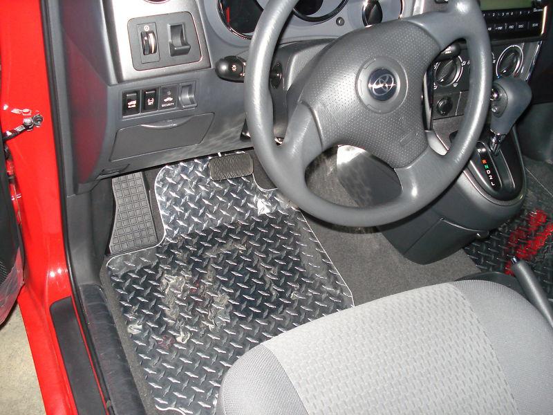 Matrix  aluminum diamond plate floor mats.  front and rear  custom shaped