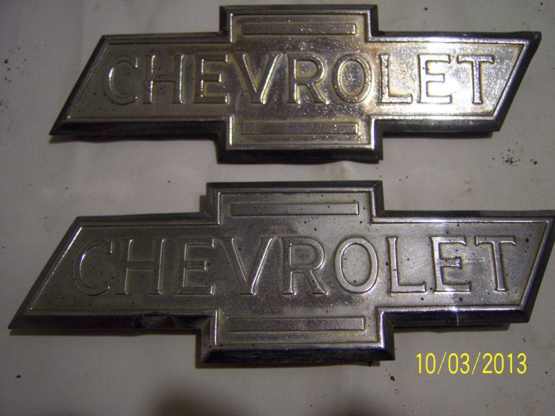 Chevrolet hood emblems from a 1936 chevy pickup. 