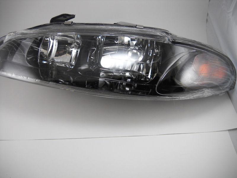  mitsubishi driverside headlight replacement 1997-1999(new never used)