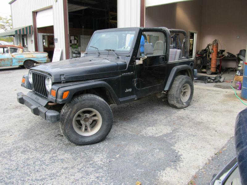 1998 jeep wrangler 4 cyl  5 speed a/c no reserve