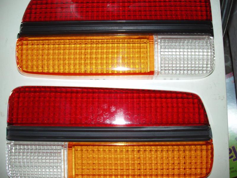 New datsun 240z taillight  with  trim pieces  