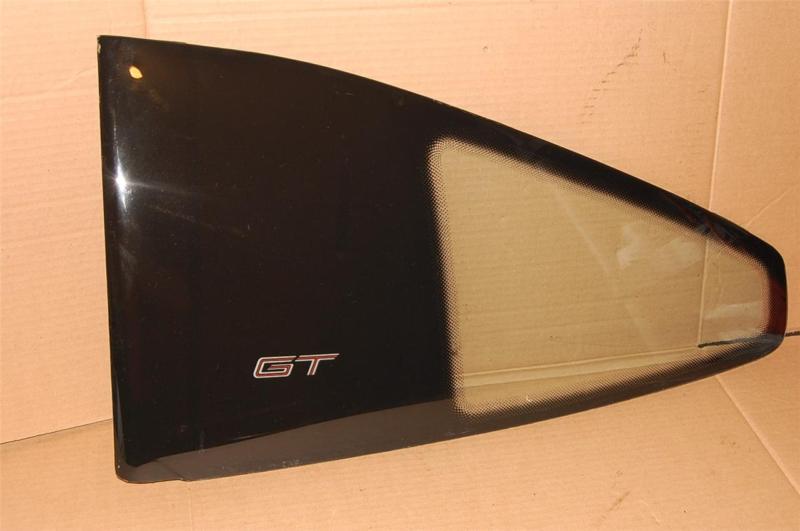 Pontiac fiero gt factory driver left quarter window sail panel