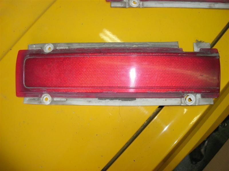 Antique vintage 1976 aspen r/t drivers side tail light reflector extension