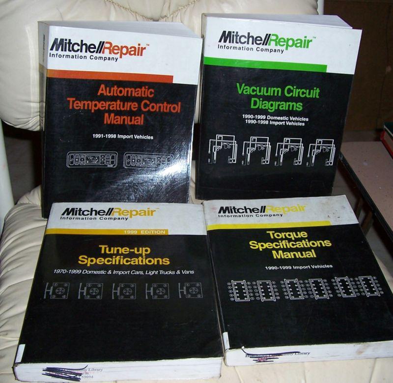 Mitchell repair information company books. (4) repair car manuals tune up specs.