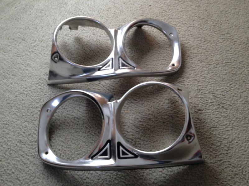 Pair of 66 67 ford fairlane headlight bezels 