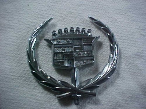 Cadillac emblem believe to be for a  1965 cadillac