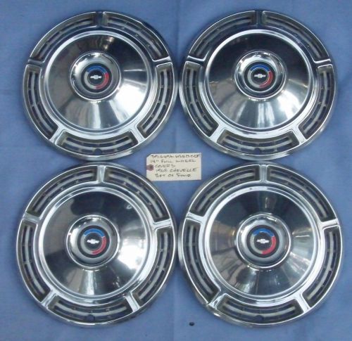 3916496 set of 4 1968 chevy chevelle 14&#034; stainless full wheel covers used oem