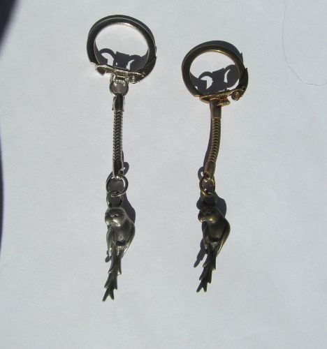 Key chain parrots 2 metal 1 bronze one silver about 4 inch long