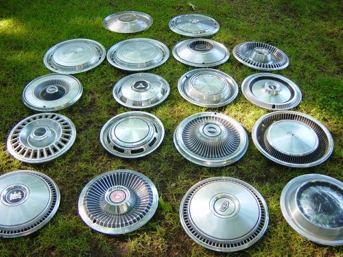 18 different vintage wheel covers many makes and models