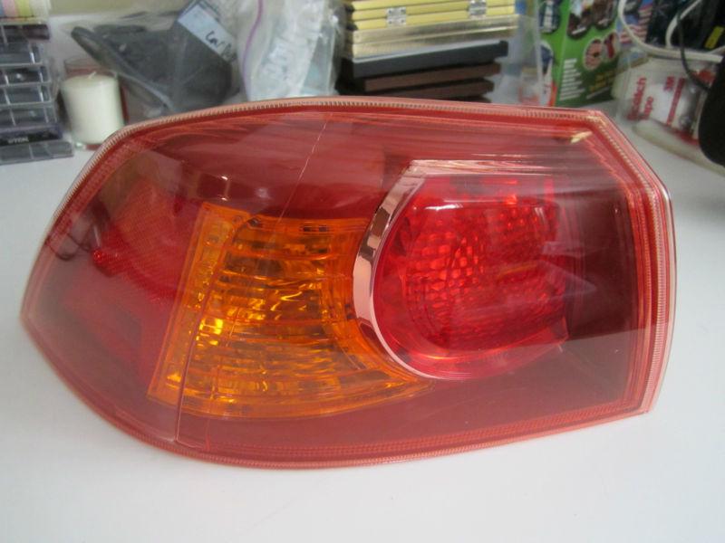 Replacement outer tail light drivers side  for evo