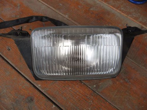 1994 - 1995  arctic cat cougar 440 puma headlight and mount part # 0606-830
