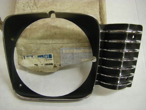 Nos 1969-72 nova headlamp bezel. 68 ,69, 70, 71 chevy ii, ss 350 396 h/l door