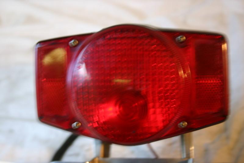 Sell HONDA GL1000 TAIL LIGHT STAY LENS ASSEMBLY OEM AHRMA 1977 9529