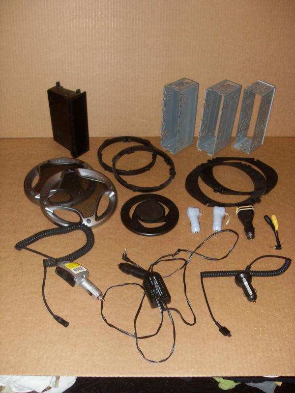 Assorted car audio. receiver speaker dash kit wires cigaretter lighter adapters