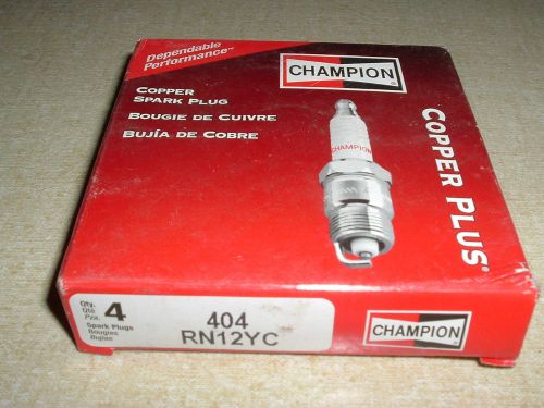 Box of (4) champion spark plugs new  404 rn12yc  copper plus nos