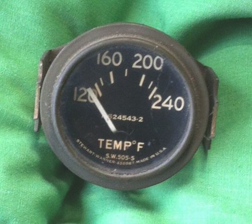 Vintage willys stewart warner temp gauge with military and manufacture number.