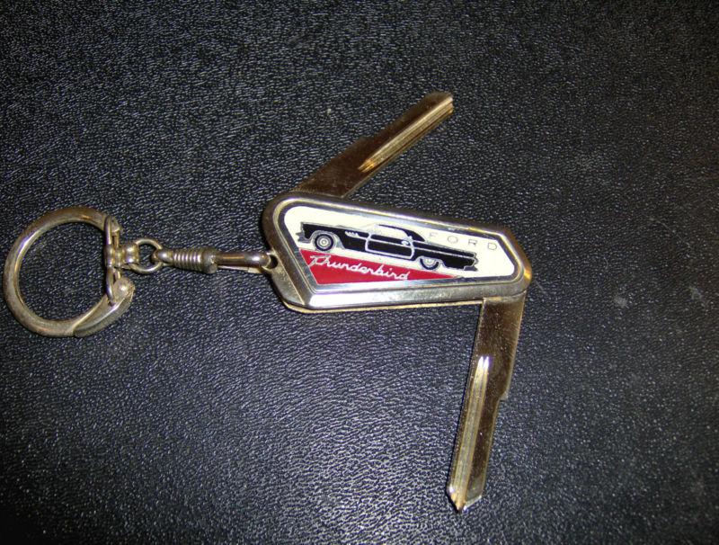 Nos vintage ford thunderbird t-bird logo foldable gold uncut crest key emblem