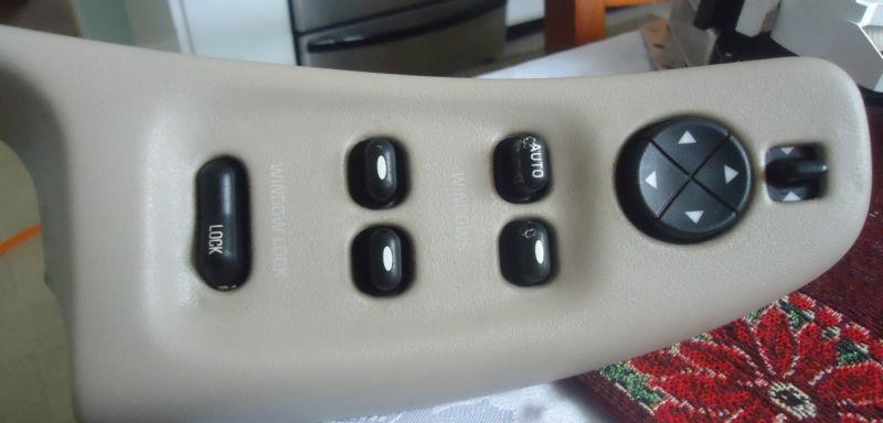 98 99 00 01 02 olds intrigue master window switch oem    tan