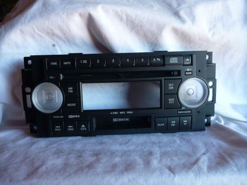 04-10 chrysler dodge jeep  6 cd cassette faceplate replacement p05064032an