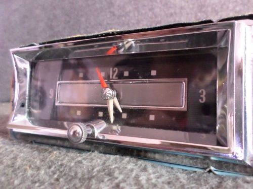1957 cadillac dash clock (nice chrome)