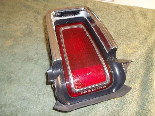 1969 oldsmobile cutlass left tail light assy with housing &amp; bezel nice