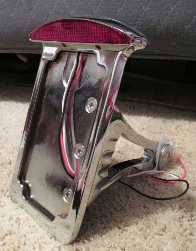 Side mount vertical license plate bracket frame tail light