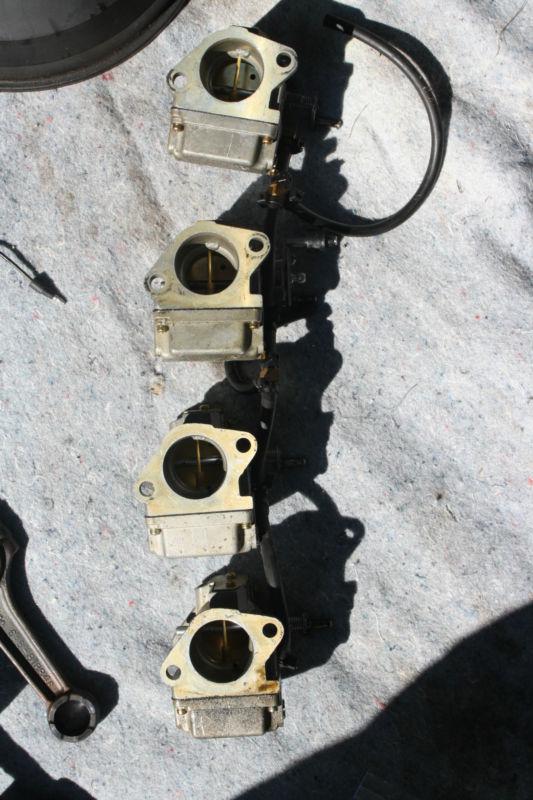 1990 mercury 115hp straight 4 cyl carburetors. all 4 together.