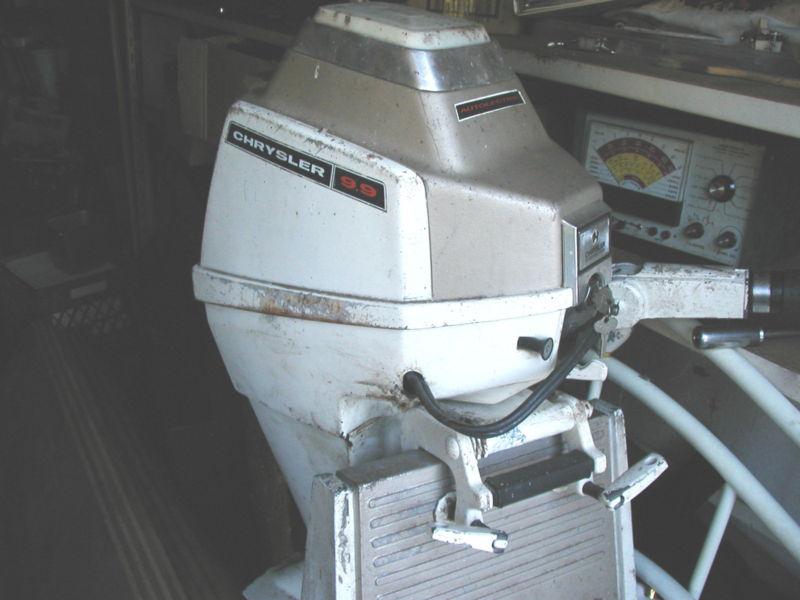 Chrysler 9.9 hp  electric start outboard motor with fact engine stand vintage