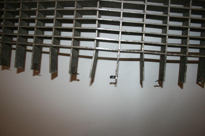 1957 cadillac silver grills (pair)  eldorado or deville