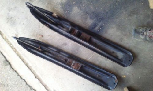 2 steel polaris indy skiis with plastic skins and good carbide runners