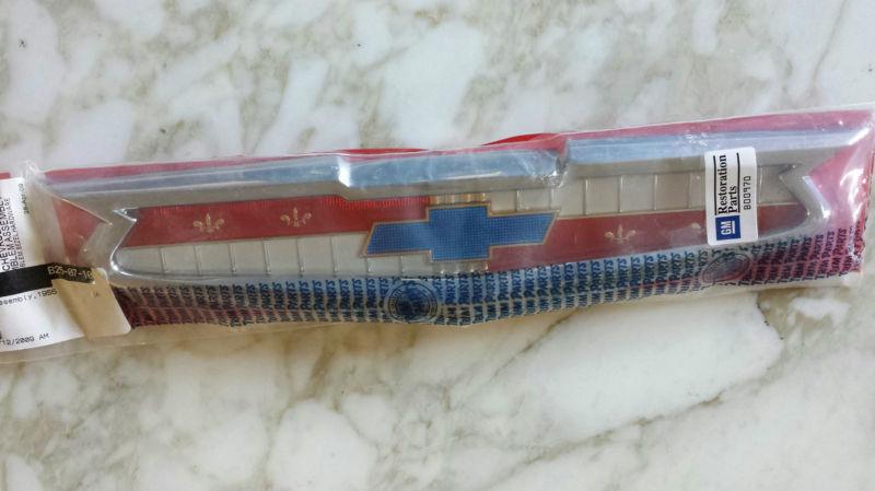 55 1955 chevy rear trunk emblem bezel assembly