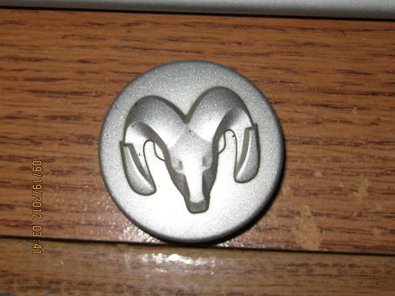 Center cap-2001-2006-dodge stratus- measures across front 1 15/16