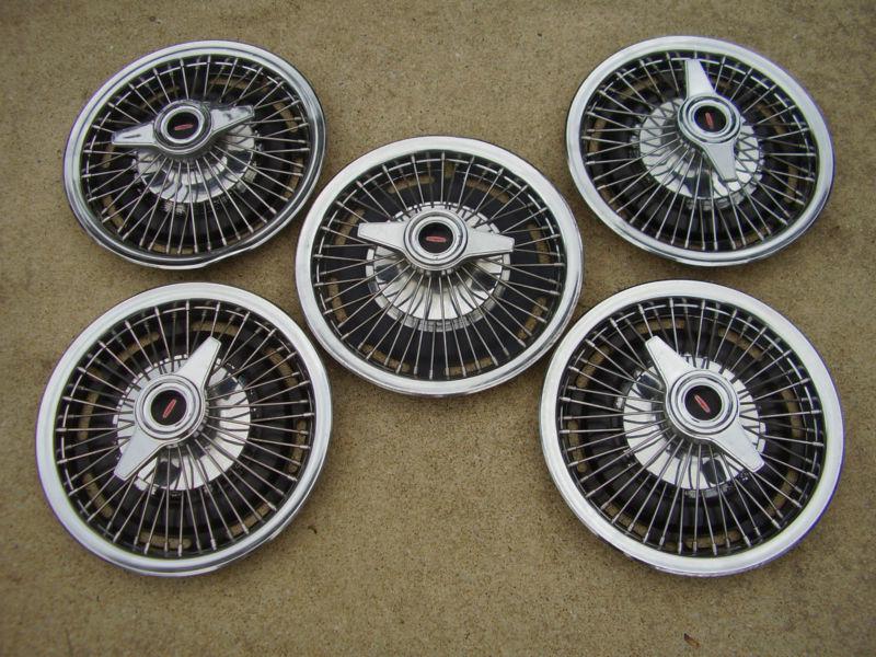 Purchase !964 WIRE SPOKE HUBCAPS W/ SPINNERS, OLDS F85 CUTLASS, (set
