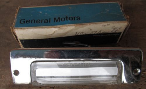 Nos 1957 chevy rear license light assembly gm part # 898309 new in box