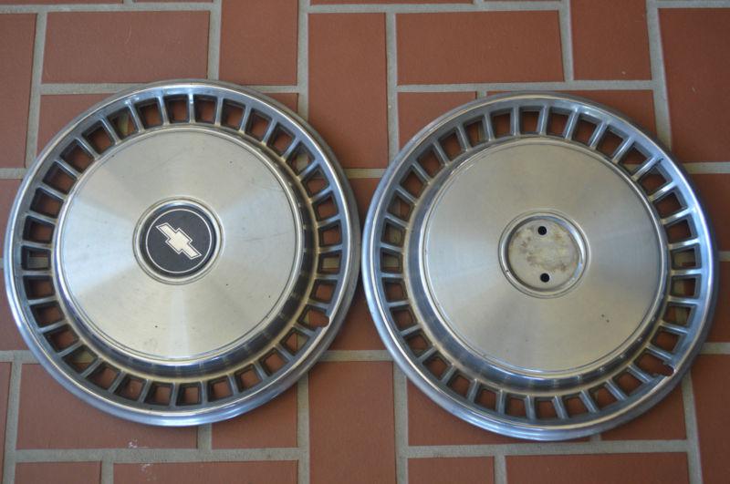 Pair of 1974-79 chevrolet impala caprice estate classic 15" hubcaps 75 76 77 78