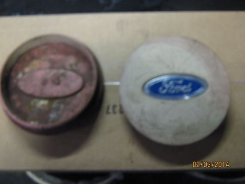 2  ford taurus hub caps- wheel centers