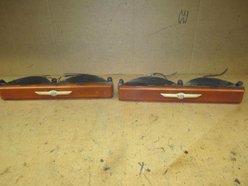 Cadillac deville fleetwood rwd brougham turn signal set w/ gold emblem rh & lh
